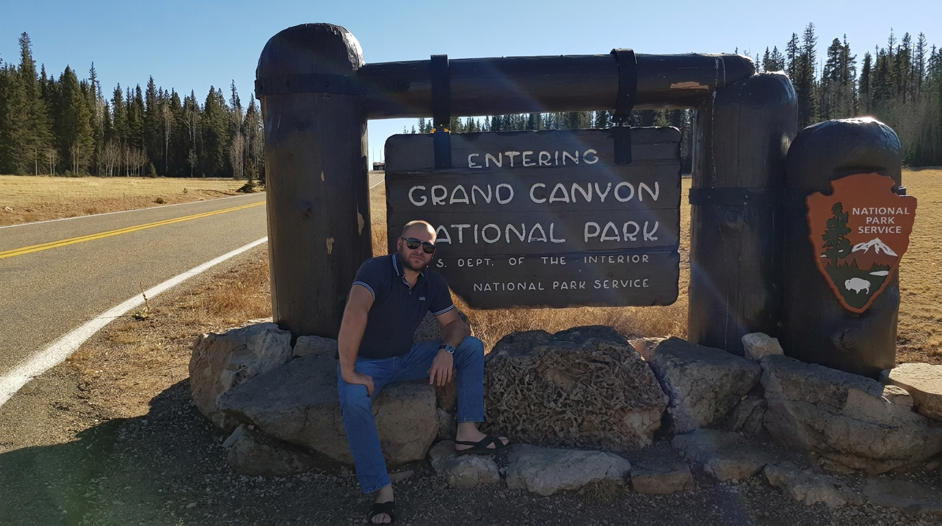 Andrey at the Grand Canyon National Park sign