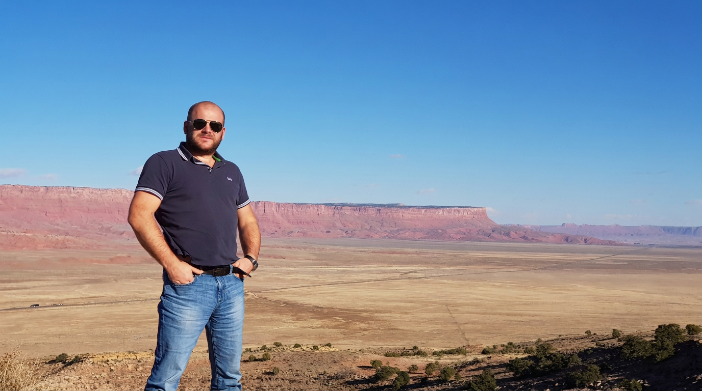 Andrey overlooking the desert mesas he owns